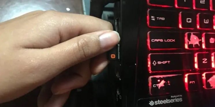 Remove the adapter from the computer